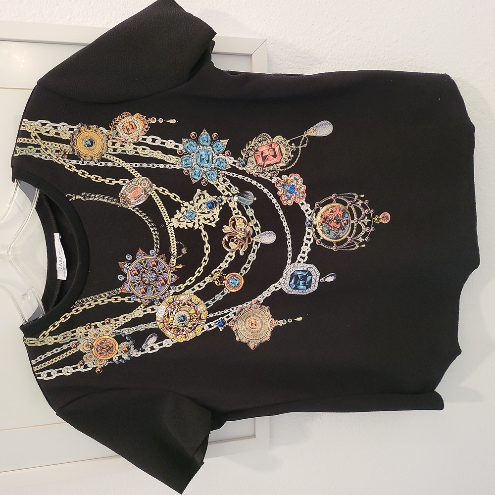 Printed jewels on black knit tee
